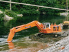 Manapouri Power Scheme, Hitachi UH801 excavating tailrace