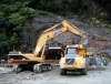 Manapouri power scheme, Deep Cove, portal works Cat 375L & A40D