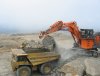 DHML EX1900 loading 777D with Cat D9 in support, 2007, Stockton Mine.JPG