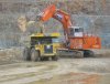 DHML Komatsu 785 loaded by Hitachi EX1800 at Mt Fred Quarry, Stockton Mine.JPG